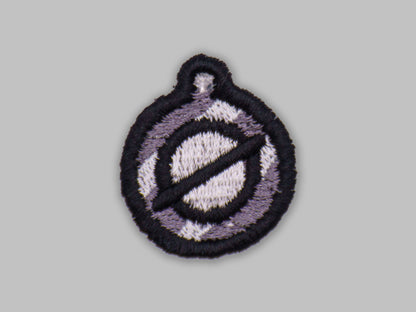 Circular patch with a design on a gray background