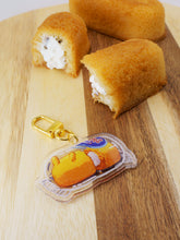 Load image into Gallery viewer, Slugsies Golden Sponge Cake Keycharm
